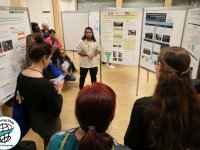 Nishant discussing his research results during poster session